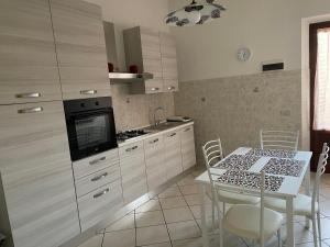 Kuchyň nebo kuchyňský kout v ubytování Rondi-Home + 8 fotografií