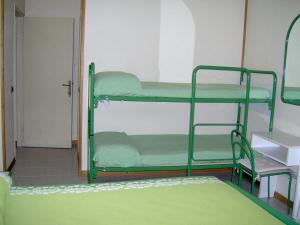 Postel nebo postele na pokoji v ubytování Lago Maggiore