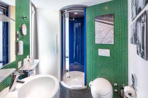 Ванна кімната в Sedartis Swiss Quality Hotel