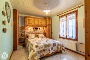 Postel nebo postele na pokoji v ubytování Gîte Annecy 06 - Au Royaume des Marmottes - Appt 06