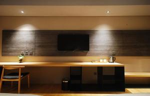 TV a/nebo společenská místnost v ubytování Chiayi Guanzhi Hotel