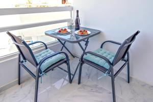 Drykkir á Modern Studio with a Sea View and Pool Access Ponderosa 801