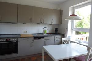 Kuhinja ili čajna kuhinja u objektu Ferienwohnung im Kieler Süden