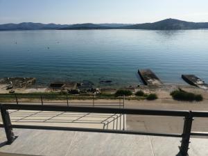 a view of a large body of water at Delfino - apartman uz more in Betina