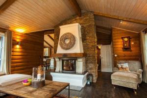 Гостиная зона в Luxury cabin in the mountains with all facileties