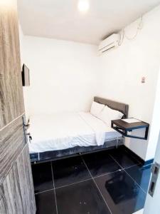 Postel nebo postele na pokoji v ubytování SBY Residence by ecommerceloka