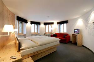 Postel nebo postele na pokoji v ubytování 3100 Kulmhotel Gornergrat
