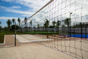 a tennis net on a tennis court at Aldiana Club Zanzibar Kwanza in Kizimkazi
