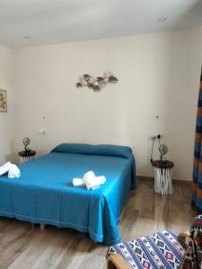 Postel nebo postele na pokoji v ubytování Casa Woow