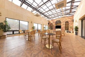 TV a/nebo společenská místnost v ubytování Hotel Demer Mokpo