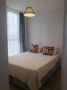 Ein Bett oder Betten in einem Zimmer der Unterkunft Aybüke Apart