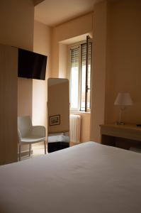 A bed or beds in a room at Villa Riari Garden Még 37 kép