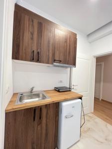 Dapur atau dapur kecil di Liel Apartments