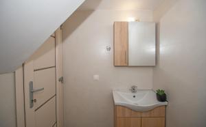 A bathroom at Gold Olive Suites by "elite"