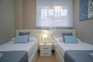 Łóżko lub łóżka w pokoju w obiekcie Casa Maui Ivan Luxury Homes 9ªPta Sur 1ªLínea