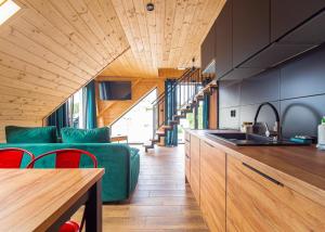 Kuchyň nebo kuchyňský kout v ubytování Apartamenty Sailor