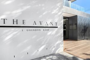 a sign that reads the want on a building at Casa on Quendon by Totalstay in Cape Town