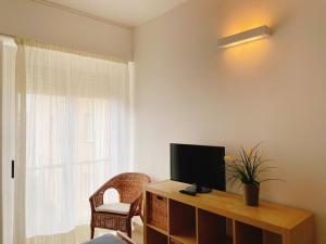 A television and/or entertainment centre at IL GABBIANO