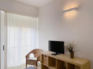 A television and/or entertainment centre at IL GABBIANO