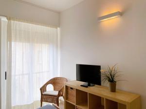 A television and/or entertainment centre at IL GABBIANO