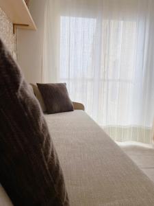A bed or beds in a room at IL GABBIANO