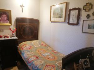 Postel nebo postele na pokoji v ubytování Luciano e Concetta
