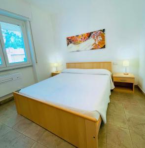 A bed or beds in a room at IL GABBIANO