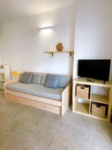 A television and/or entertainment centre at IL GABBIANO
