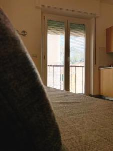 A bed or beds in a room at IL GABBIANO