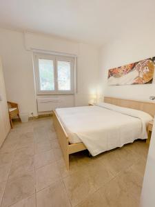 A bed or beds in a room at IL GABBIANO