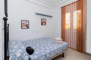 Postel nebo postele na pokoji v ubytování Espanatour Apartamento Valencia + 14 fotografií