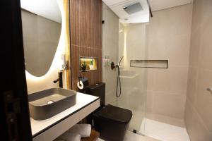 Vannituba majutusasutuses Le M Hôtel