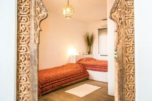 Posteľ alebo postele v izbe v ubytovaní Villa Tarifa Lodge