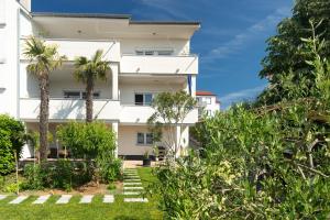 Vonkajšia záhrada v ubytovaní Apartments Oleander
