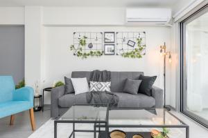 Posezení v ubytování Amore 2-BR Apt By Finikoudes