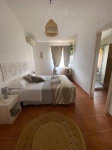 Postel nebo postele na pokoji v ubytování B&B La Pitraia