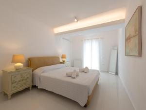 Cama ou camas em um quarto em Aeri Villas & Apartments mais 37 fotos
