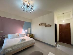 Katil atau katil-katil dalam bilik di Dongjin Bay B&B
