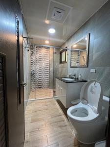 Vannituba majutusasutuses Dongjin Bay B&B +27 fotot