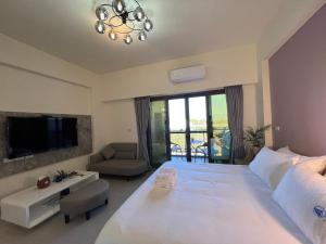 Katil atau katil-katil dalam bilik di Dongjin Bay B&B