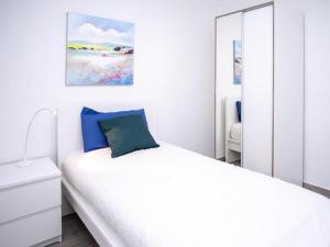 A bed or beds in a room at Live Santa Cruz Venezuela