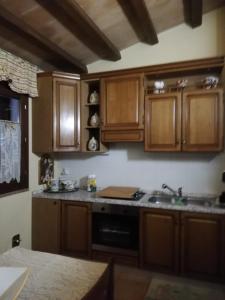 Kuchyň nebo kuchyňský kout v ubytování Casa Vacanze Torretta