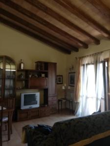 TV a/nebo společenská místnost v ubytování Casa Vacanze Torretta