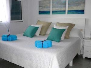 Een bed of bedden in een kamer bij Apartamento los Llanitos en La Asomada