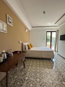 Postel nebo postele na pokoji v ubytování Maera B&B Ravello