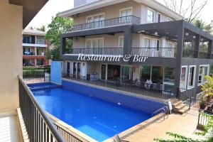 Sundlaugin á 2bhk Sparkling Apartment with POOL eða í nágrenninu