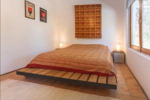 Posteľ alebo postele v izbe v ubytovaní Villa Tarifa Lodge