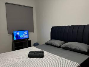 Μια τηλεόραση ή/και κέντρο ψυχαγωγίας στο 2BR Seksyen16 Uitm Shah Alam, i-City,Jakel