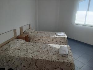 Postel nebo postele na pokoji v ubytování Mar de Oropesa II