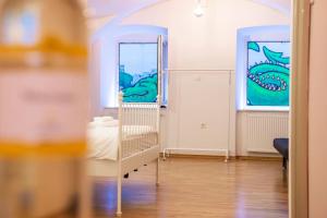 a room with a room with a mirror and a room with a room at Dragon's Cave in Ljubljana +5 photos